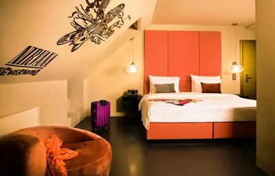Ein Bett oder Betten in einem Zimmer der Unterkunft Design-Hotel JAMS