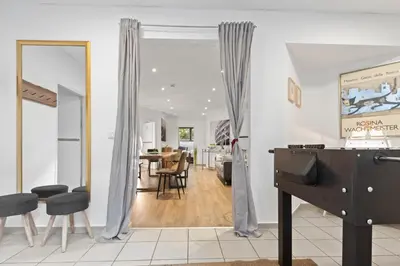 Ein Sitzbereich in der Unterkunft Flatista Homes - Garden House