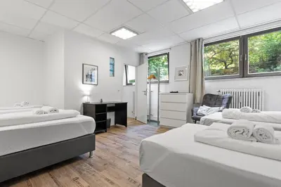 Ein Bett oder Betten in einem Zimmer der Unterkunft Flatista Homes - Garden House