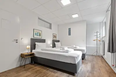 Ein Bett oder Betten in einem Zimmer der Unterkunft Flatista Homes - Garden House