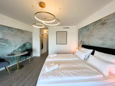 Ein Bett oder Betten in einem Zimmer der Unterkunft NEW I GREAT CITY VIEW I 32 FLOOR I BOXSPRINGBED and NETFLIX