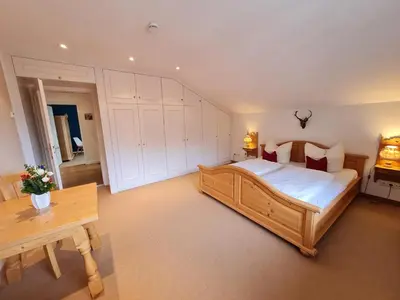 Ein Bett oder Betten in einem Zimmer der Unterkunft AlpenHorizont