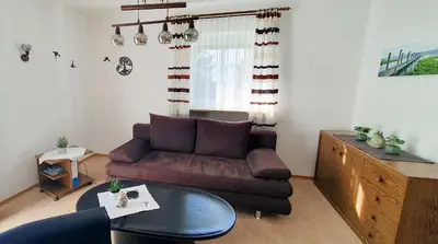 Ein Sitzbereich in der Unterkunft Ferienwohnungen Trattler