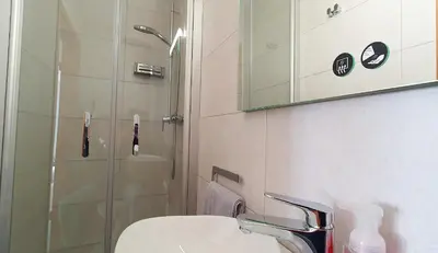 Ein Badezimmer in der Unterkunft Ferienwohnungen Trattler