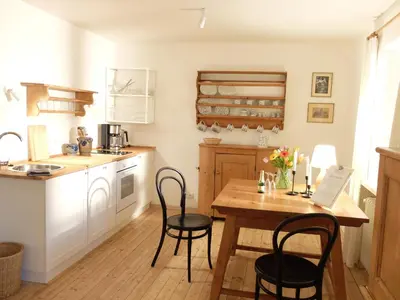 Küche/Küchenzeile in der Unterkunft Gartenstudio-Apartment Tausendfreund - adults only - am Chiemsee