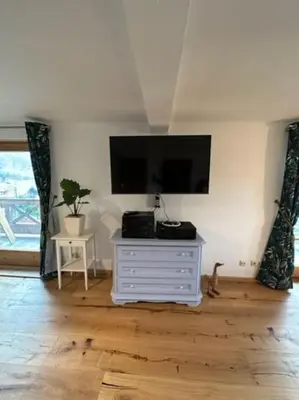 TV/Unterhaltungsangebot in der Unterkunft Charmante farbenfrohe Wohnung für zwei