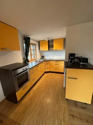 Küche/Küchenzeile in der Unterkunft Charmante farbenfrohe Wohnung für zwei