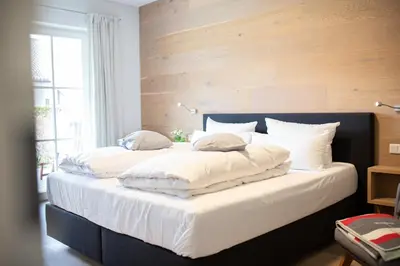 Ein Bett oder Betten in einem Zimmer der Unterkunft Königsblick