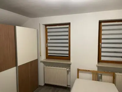 Ein Bett oder Betten in einem Zimmer der Unterkunft Monteursunterkunft Egenhofen - fitters' accommodation with shared kitchen