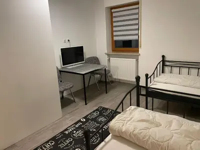 Ein Bett oder Betten in einem Zimmer der Unterkunft Monteursunterkunft Egenhofen - fitters' accommodation with shared kitchen
