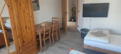 Ein Bett oder Betten in einem Zimmer der Unterkunft Monteursunterkunft Egenhofen - fitters' accommodation with shared kitchen