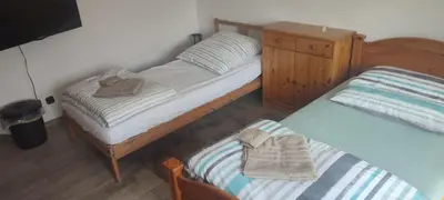 Ein Bett oder Betten in einem Zimmer der Unterkunft Monteursunterkunft Egenhofen - fitters' accommodation with shared kitchen