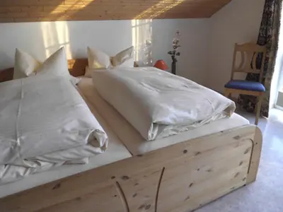 Ein Bett oder Betten in einem Zimmer der Unterkunft Gästehaus am Rathaus, Doppelzimmer 1