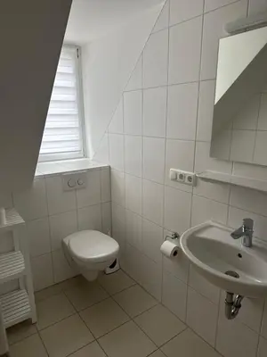 Ein Badezimmer in der Unterkunft Alter Wirt Ramersdorf