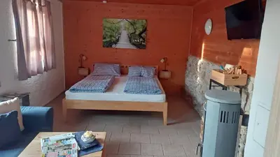 Ein Bett oder Betten in einem Zimmer der Unterkunft Ferienwohnung Hofbauer