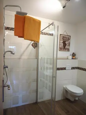 Ein Badezimmer in der Unterkunft Schlossalm Ferienwohnungen