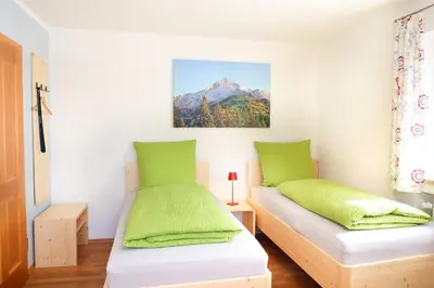 Ein Bett oder Betten in einem Zimmer der Unterkunft Ferienwohnung BERGerholen