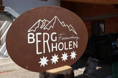 Ein Zertifikat, Auszeichnung, Logo oder anderes Dokument, das in der Unterkunft Ferienwohnung BERGerholen ausgestellt ist