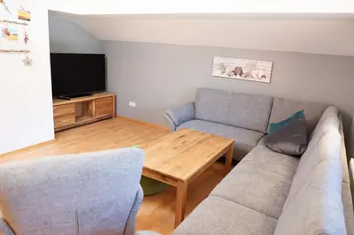 Ein Sitzbereich in der Unterkunft Ferienwohnung BERGerholen