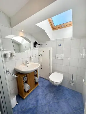 Ein Badezimmer in der Unterkunft Ferienwohnung BERGerholen