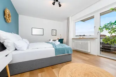 Ein Bett oder Betten in einem Zimmer der Unterkunft UNiQE - design apartment - SKY-TV - kitchen - free parking
