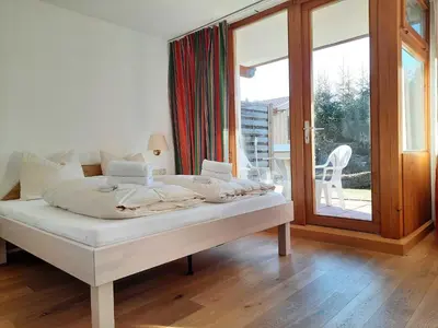 Ein Bett oder Betten in einem Zimmer der Unterkunft Alpin-Apartment-11