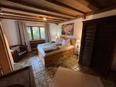 Ein Bett oder Betten in einem Zimmer der Unterkunft Alpen Suite Tegernsee - große Sonnenterasse und idyllischer Garten