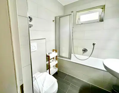 Ein Badezimmer in der Unterkunft Maisonettewohnung Steinbock mit Bergblick