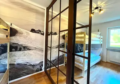 Ein Bett oder Betten in einem Zimmer der Unterkunft Maisonettewohnung Steinbock mit Bergblick