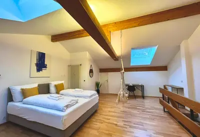 Ein Bett oder Betten in einem Zimmer der Unterkunft Maisonettewohnung Steinbock mit Bergblick