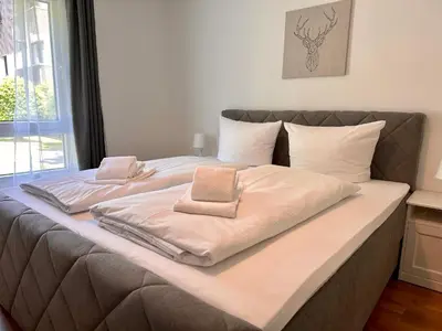 Ein Bett oder Betten in einem Zimmer der Unterkunft Apartment BERGseetraum - Bergblick, neu renoviert, gemütlich, familienfreundlich