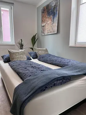 Ein Bett oder Betten in einem Zimmer der Unterkunft nice2be Apartments