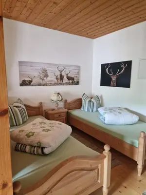 Ein Bett oder Betten in einem Zimmer der Unterkunft Ferienwohnung Sonnenschein