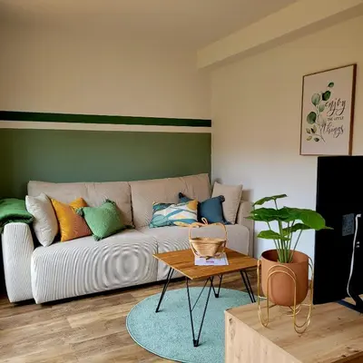 Ein Sitzbereich in der Unterkunft Ferienwohnung Am Hochfeld