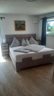 Ein Bett oder Betten in einem Zimmer der Unterkunft Apartement auf dem Lande