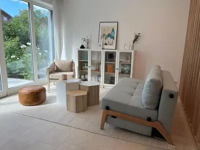 Ein Sitzbereich in der Unterkunft Design Apartment Alpenvorstadt