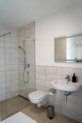 Ein Badezimmer in der Unterkunft Design Apartment Alpenvorstadt
